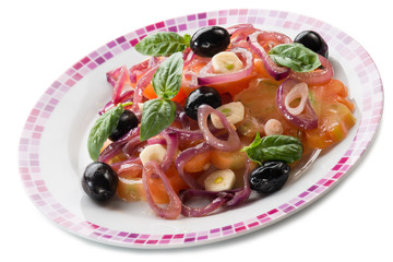 salad with ox heart tomatoes, onions olives and garlic