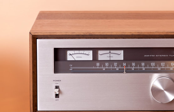 Vintage hi-fi Stereo Tuner in wooden cabinet