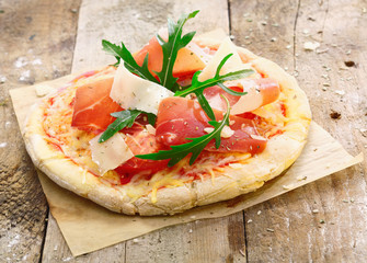 Freshly prepared delicious pizza