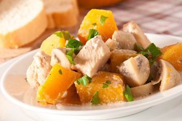 Stew chicken with vegetables and mushrooms in a cream sauce 