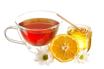 Jar of honey and tea cup