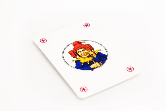 playing card with jolly on white background