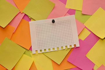 Blank note paper isolated on colorful background