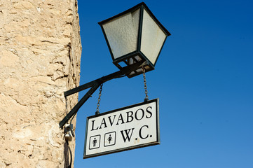 Lamp and toilet sign