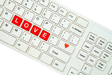 Wording Love on computer keyboard isolated on white background