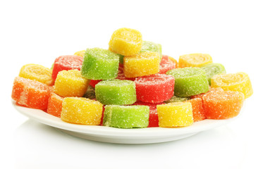 colorful jelly candies on plate isolated on white.