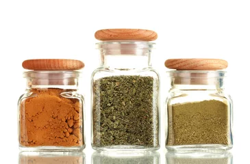 Foto auf Alu-Dibond powder spices in glass jars  isolated on white © Africa Studio
