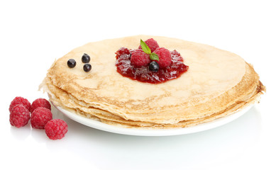 Delicious pancakes with berries and jam