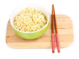 asian noodles in bowl on wooden board isolated on white
