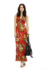 Female mode in evening with handbag at fashion show in studio