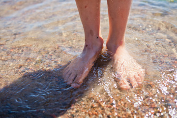 Feet in water