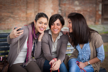 Three Beautiful Women taking Self Portraits