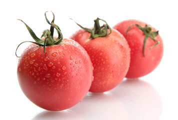 Fresh tomatoes isolated on white
