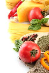 Pasta spaghetti, vegetables and spices, isolated on white