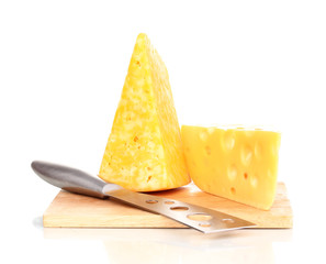 tasty cheese and knife on wooden board isolated on white