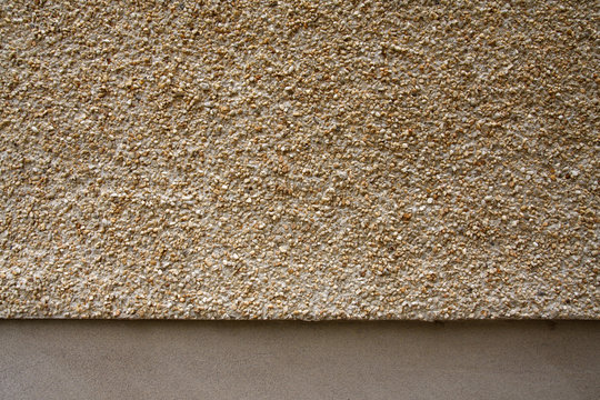 Pebbledash and concrete wall render