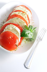 Caprese salad, tomatoes, mozzarella and basil