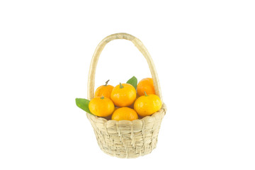 small oranges in basket