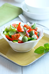 Mediterranean-style salad with feta cheese and green olives