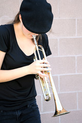 Female trumpet player.