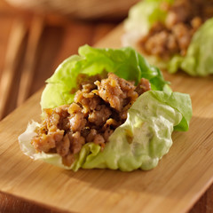 Asian lettuce wrap with minced chicken and seasonings