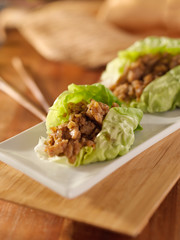 Asian lettuce wrap with minced chicken and seasonings