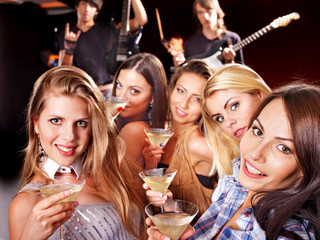 Woman on disco in night club.