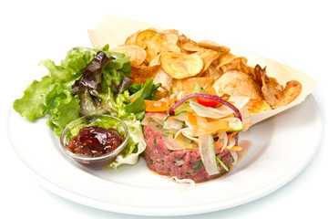 tasty tartare with potatoes and salad