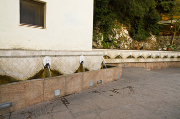 Fountain of mountain Spili, Crete with lion heads Venetian