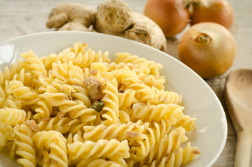 Fusilli with tuna, capers and ginger closeup