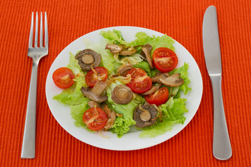 salad with fried champignon with tomato
