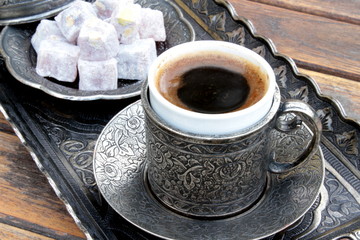 Turkish coffee and turkish delight with traditional cup and tray