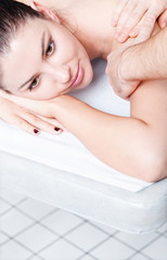 Obraz premium Beautiful woman in a day spa getting deep massage