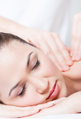 Fototapeta na wymiar Woman receives body massage at spa, close up