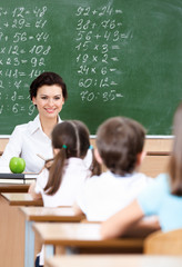 Teacher questions pupils at math