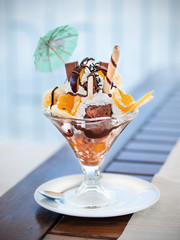 Ice cream cocktail dessert with fresh fruit, sundae