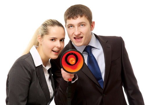 Business people with a loudspeaker