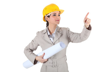 Female architect pointing
