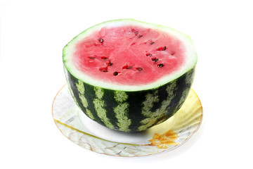 half of watermelon on plate