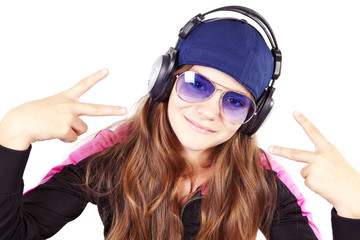 girl with headphones listen music showing peace sign