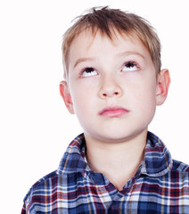 Portrait of boy looking up