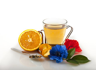 cup of tea with lemon and flowers