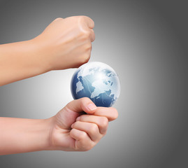 Globe ,earth in human hand against