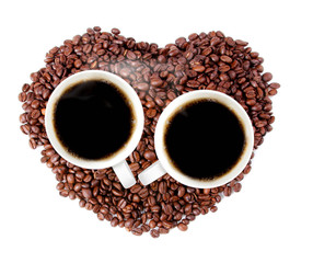 Cup of hot coffee on a Heart shape made from coffee
