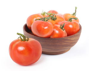 tomatoes in wooden bowl