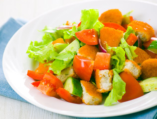 fresh vegetable salad with nuggets