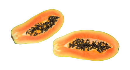 Two halves of red maradol papaya