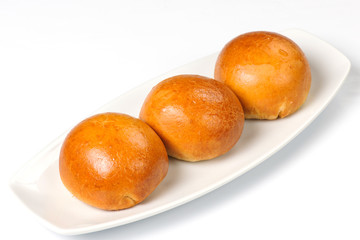 buns on a white plate