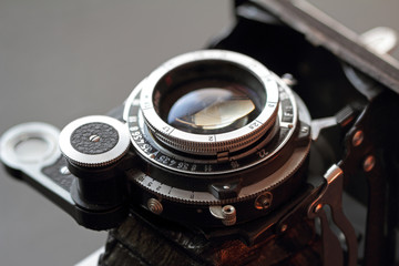 Old camera lens close-up.