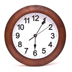 close up of an office clock on white background